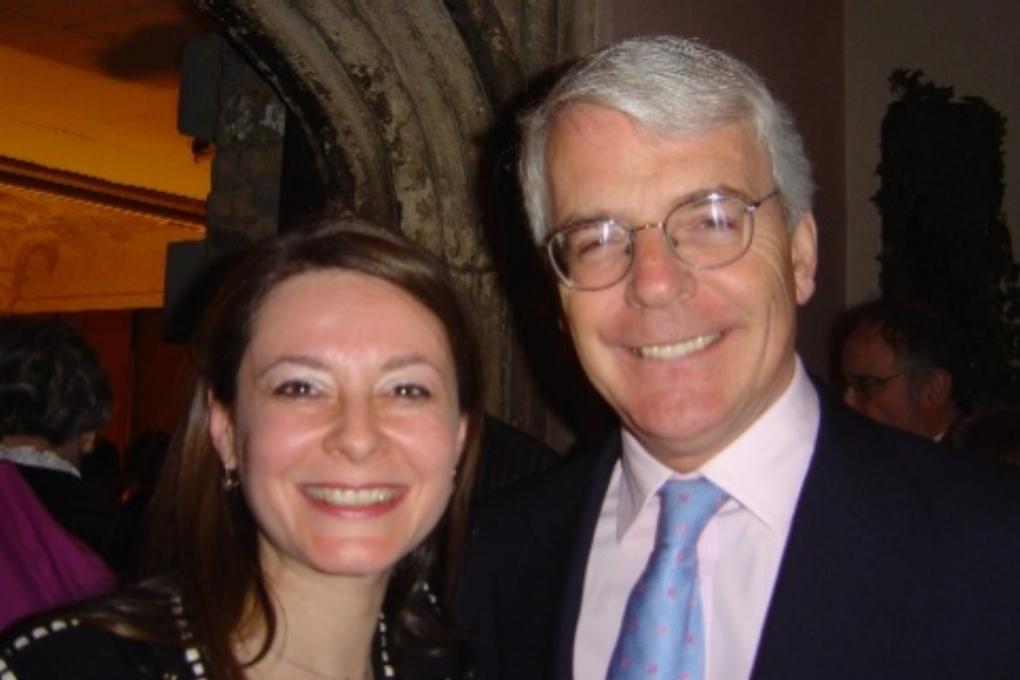 Olga Thomas with Sir John Major at a London event